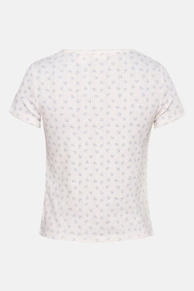 T-shirt blanc à manches courtes de Levi's, avec motif floral bleu clair et texture côtelée.