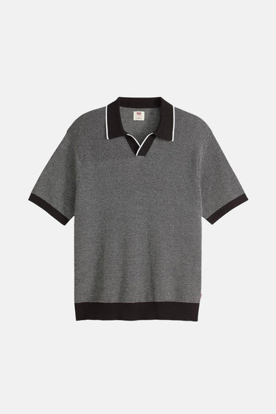Zwart poloshirt met korte mouwen van Levi's, in een getextureerd, gespikkeld breisel, met contrasterende biesjes.