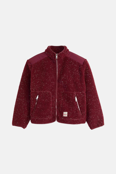 Veste courte bordeaux en polaire par Levi's®, avec empiècements unis aux épaules et poches zippées.