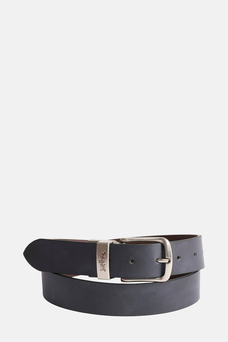 Ceinture noire en cuir de Levi's® Accessories avec boucle argentée.