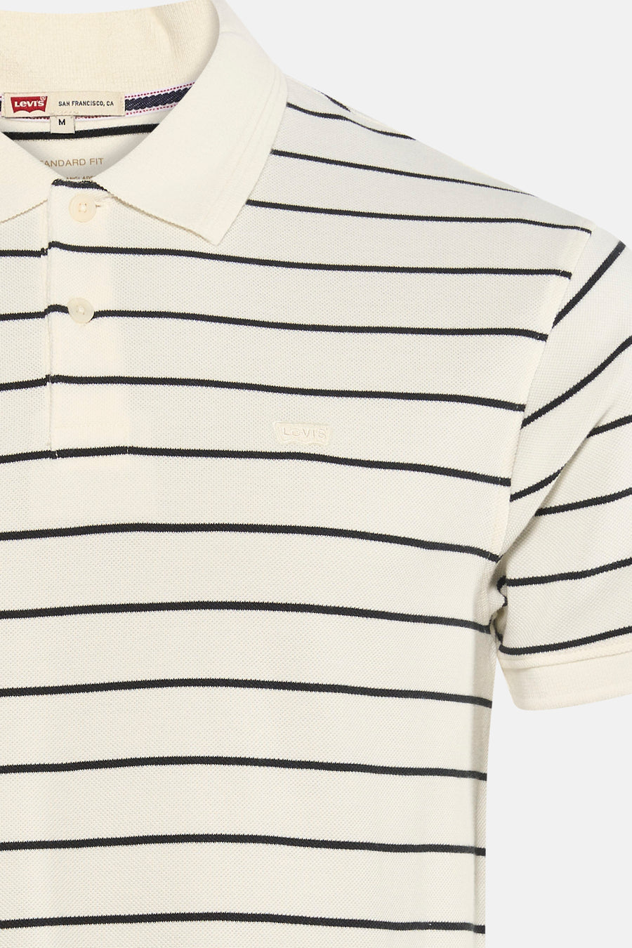 Wit gestreept poloshirt van Levi's, met knopen en discreet logo aan de voorkant.