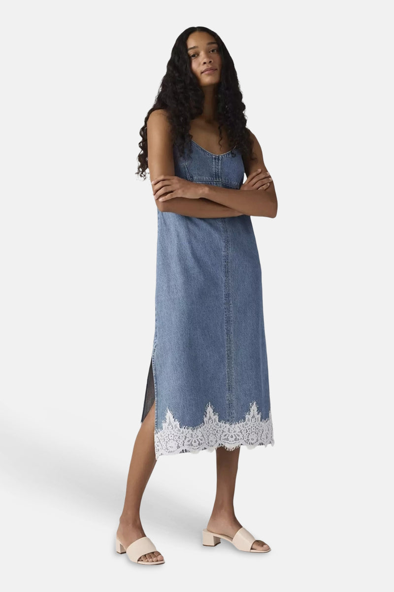 Denim robe with white lace trim by Levi's, mid-length sleeveless design, front view, model wearing beige sandals