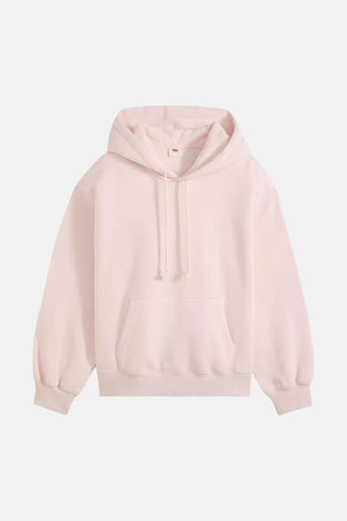 Soft pink oversized hoodie with front pocket and drawstring, by Supreme, shown in front view.