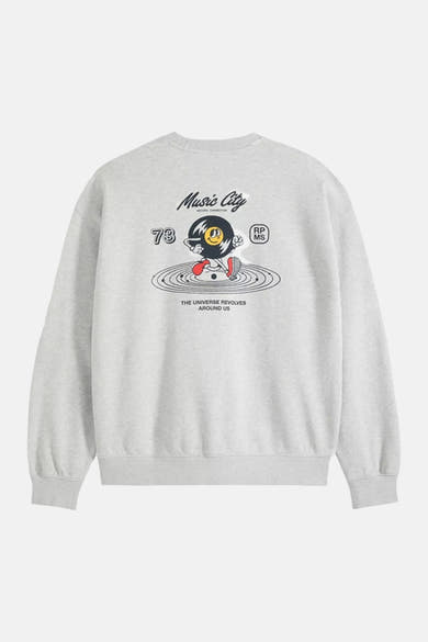 Grey crewneck sweatshirt with music-themed graphic print featuring a vinyl record character, text "Music City" and "The Universe Revolves Around Us", back view