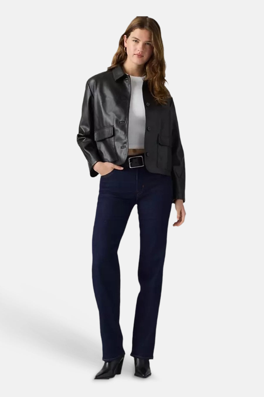 Dark blue straight-leg denim jeans by 723, worn with black leather jacket and boots, full-length front view