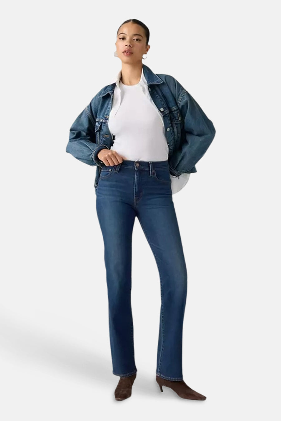 Dark blue straight-leg jeans by 723, worn with white top and denim jacket, full-length front view