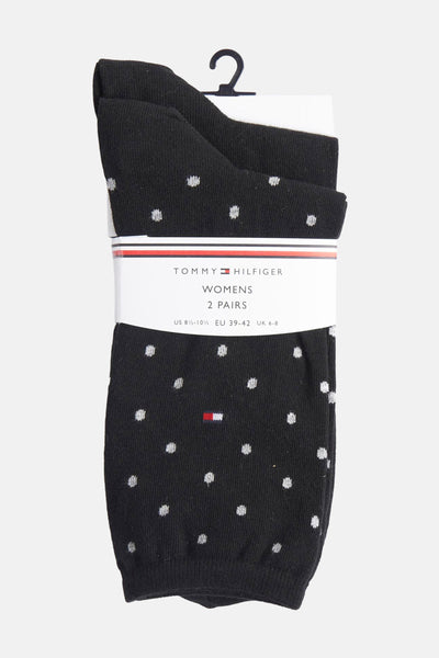 Zwarte sokken met stippen van TOMMY JEANS, gepresenteerd aan een hanger, logo detail.