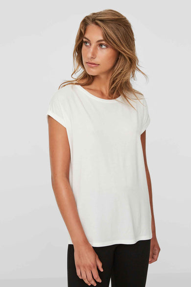 White short-sleeve top with relaxed fit and rounded neckline, worn by model in side view with black pants.