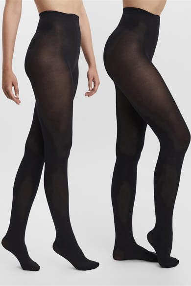 Zwarte panty van VERO MODA, gedragen op beide benen van een vrouw.