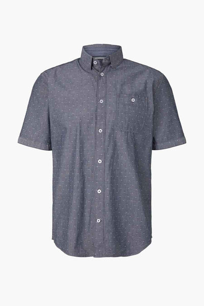 Blue short-sleeve shirt with white dot pattern, button-down front, chest pocket, and rolled cuffs, front view.