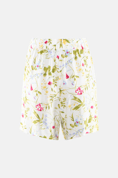 Short blanc de VERO MODA® à motif floral multicolore avec des fleurs roses, jaunes et bleues, taille élastique.