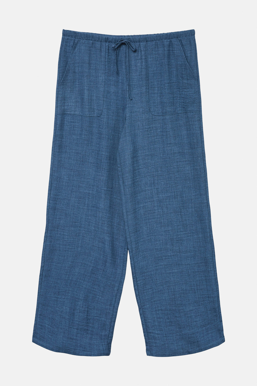 Pantalon coloré bleu de VERO MODA, à poches et cordon de serrage, sur fond uni.