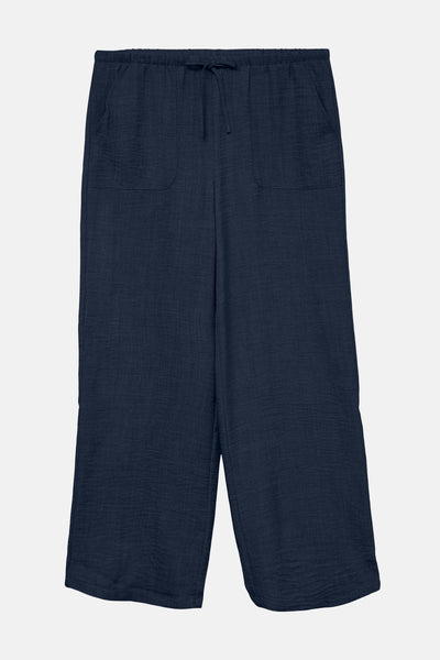 Pantalon ample bleu en gaze de coton par VERO MODA, avec cordon de serrage et poches.