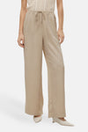 Pantalon coloré beige de VERO MODA, coupe ample avec poches et cordon de serrage à la taille.