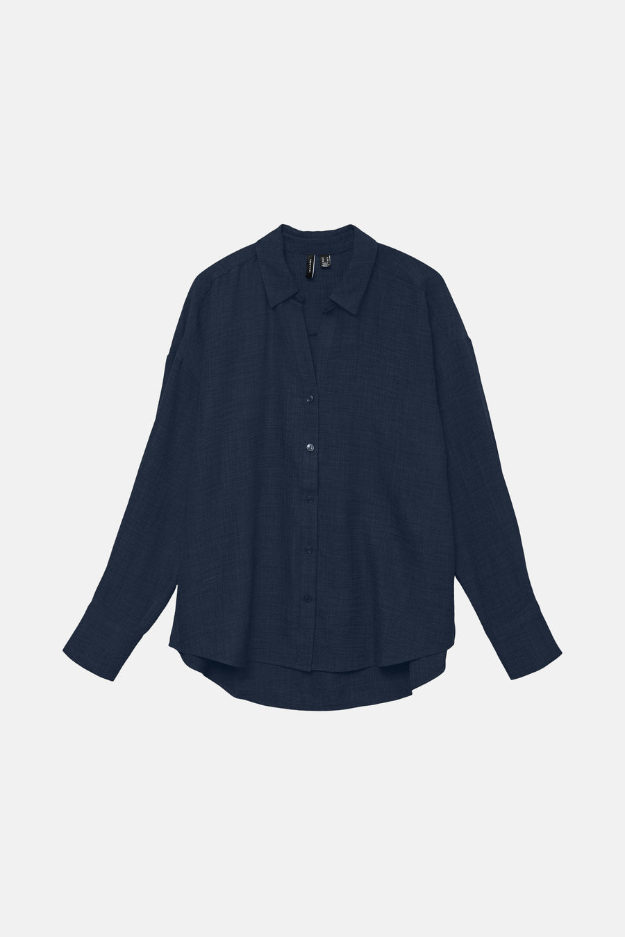 Chemise à manches longues bleue de VERO MODA, avec une texture gaufrée et une coupe asymétrique.
