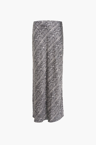 Jupe longue grise par VERO MODA® à motif peau de serpent sur fond blanc.
