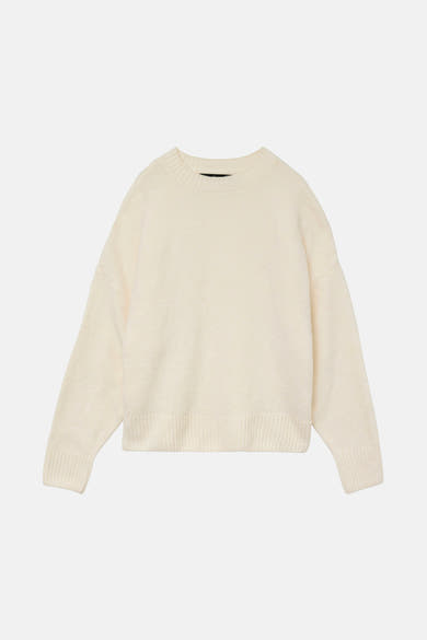 Pull écru à col rond de Vero Moda, en tricot doux avec des bords côtelés.

