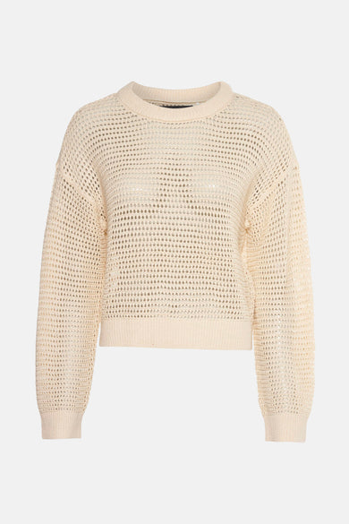 Pull écru à col rond de VERO MODA, en maille ajourée avec des manches longues et des finitions côtelées.