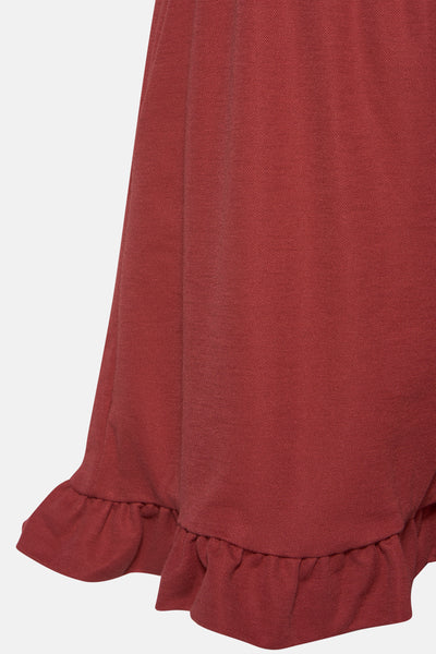 Korte rode rok van VERO MODA®, met ruchedetail aan de onderkant, getextureerde stof.