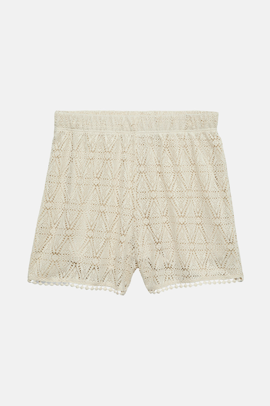 Short beige en crochet de VERO MODA, avec une bordure décorative à pompons.
