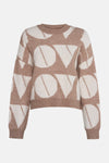 Pull à col rond beige de Vero Moda avec motif abstrait en contraste de couleurs.