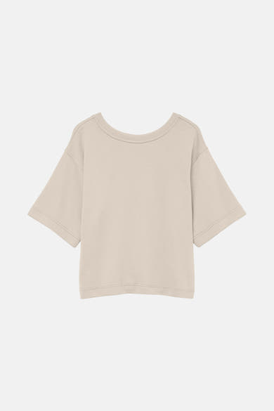 T-shirt à manches courtes écru de VERO MODA, coupe carrée sur un fond blanc.