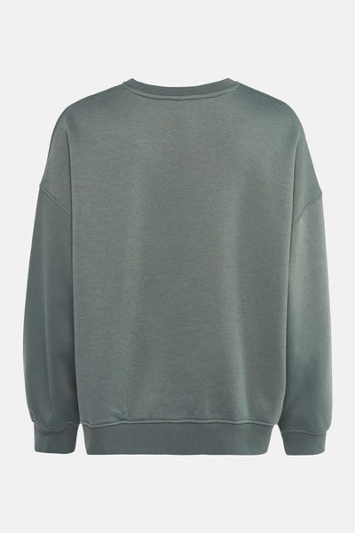 Groene trui van VERO MODA, losse pasvorm en lange mouwen, van achteren gezien.