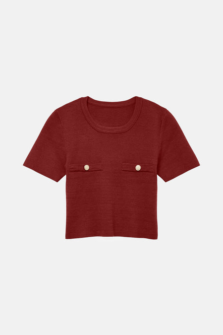 Bordeaux trui van VERO MODA met twee zakken en gouden knopen.