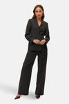 Grijze broek van VERO MODA met een asymmetrische knoopceintuur.
