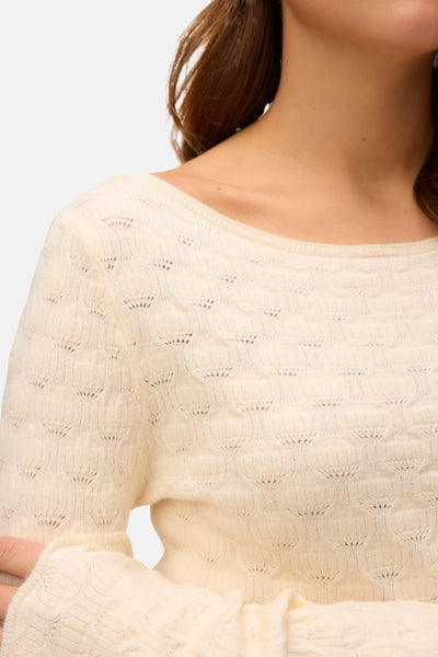 Pull à col rond beige de VERO MODA®, en tricot ajouré à motif délicat.
