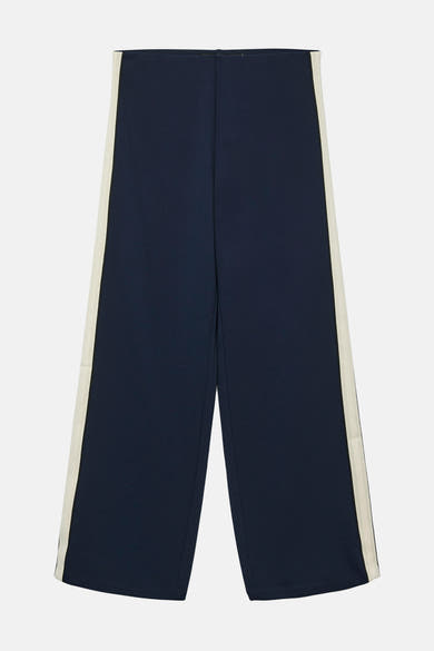 Pantalon bleu marine avec rayures latérales, par VERO MODA®, coupe ample et jambes larges.