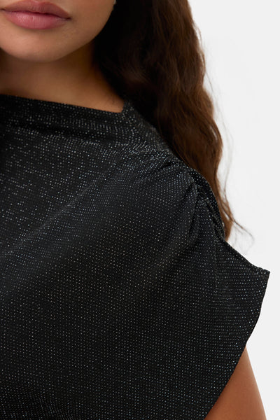 T-shirt noir à manches courtes de Vero Moda, agrémenté de points brillants.
