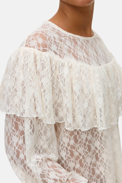 Wit overhemd met lange mouwen van VERO MODA versierd met ruches en kant.