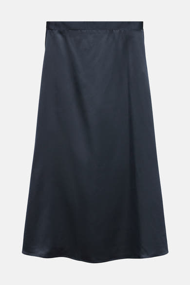 Jupe longue bleue de VERO MODA® avec une texture satinée et une coupe évasée.