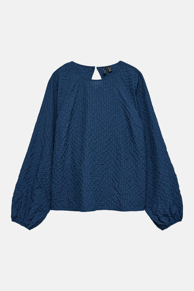 Blouse à manches longues bleue de VERO MODA®, texturée avec manches bouffantes.