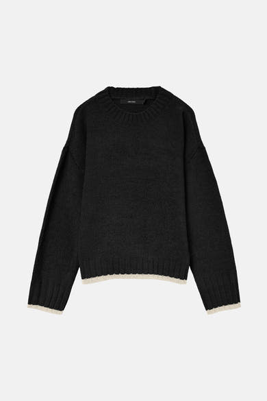 Pull à col rond noir de VERO MODA avec bordures contrastées aux poignets et à la taille.
