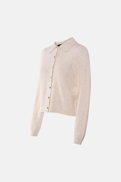 Cardigan beige de VERO MODA, en maille fine avec une coupe courte et boutonnée.