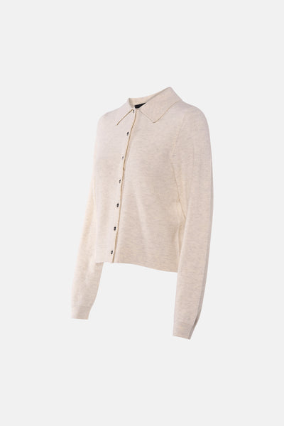 Cardigan beige de VERO MODA, en maille fine avec une coupe courte et boutonnée.