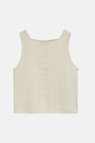 Top beige sans manches de VERO MODA, avec fermeture boutonnée au dos.
