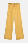 Gouden broek van VERO MODA, met elastische tailleband en gladde textuur.