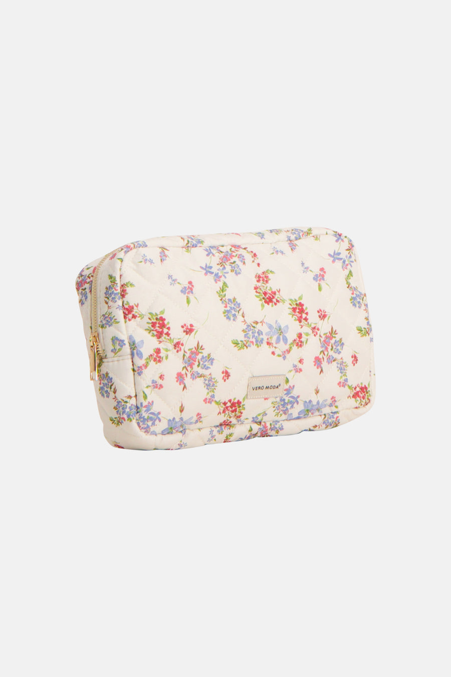 Trousse de toilette beige de VERO MODA® avec motif floral et texture matelassée.
