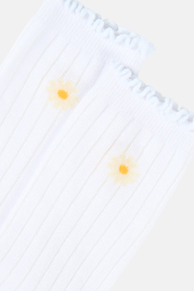 Chaussettes blanches de Vero Moda, avec motif de marguerites et bordure à volants.