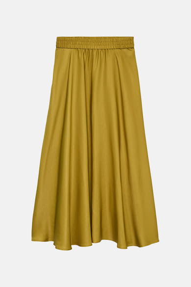 Jupe longue verte de VERO MODA® avec taille élastiquée et tissu fluide à plis doux.
