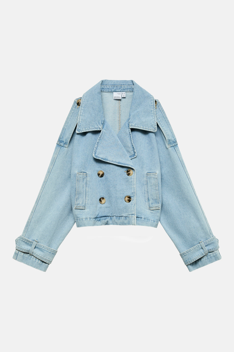 Veste courte en denim bleu clair de Vero Moda, avec double boutonnage et détails aux manches.
