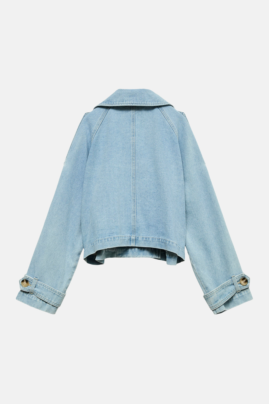 Veste courte en denim bleu clair de VERO MODA, avec col classique et manches longues à boutons.