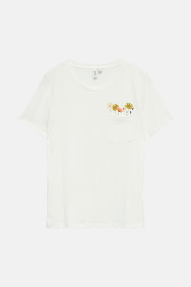 T-shirt blanc à manches courtes de VERO MODA avec poche poitrine imprimée de fleurs colorées.
