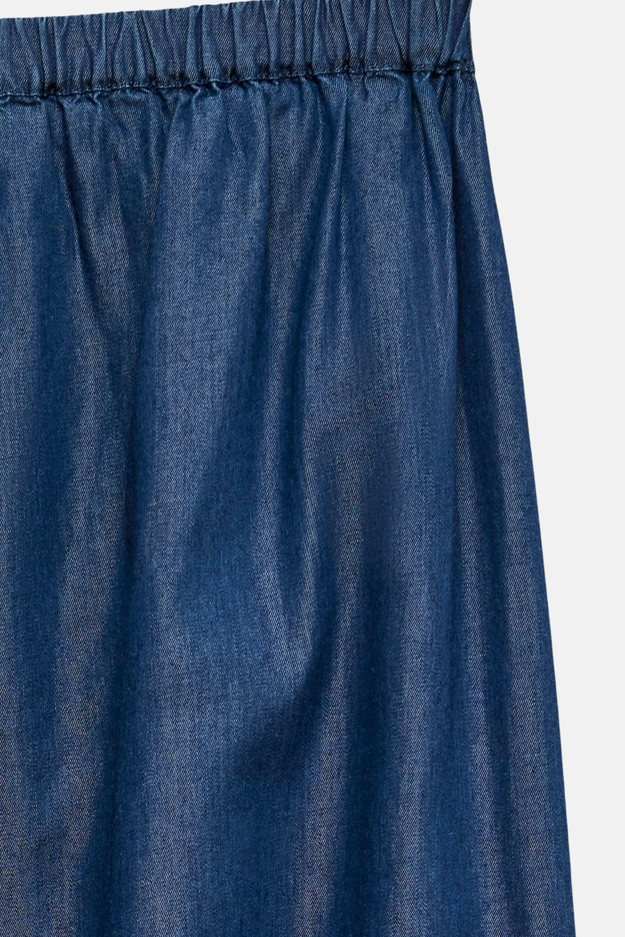 Effengekleurde blauwe broek van VERO MODA, met elastische tailleband en licht glanzende textuur.