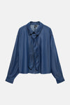 Donkerblauwe spijkerblouse van VERO MODA, lange mouwen met knoopmanchetten, rechte pasvorm.