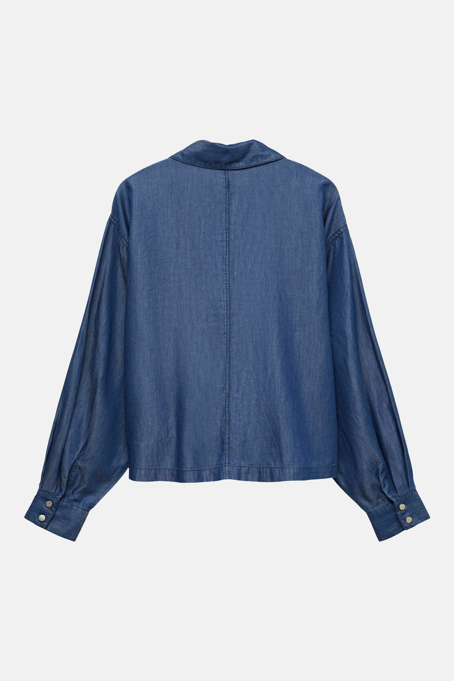 Chemise en denim bleu foncé de VERO MODA, manches longues avec poignets boutonnés, coupe droite.