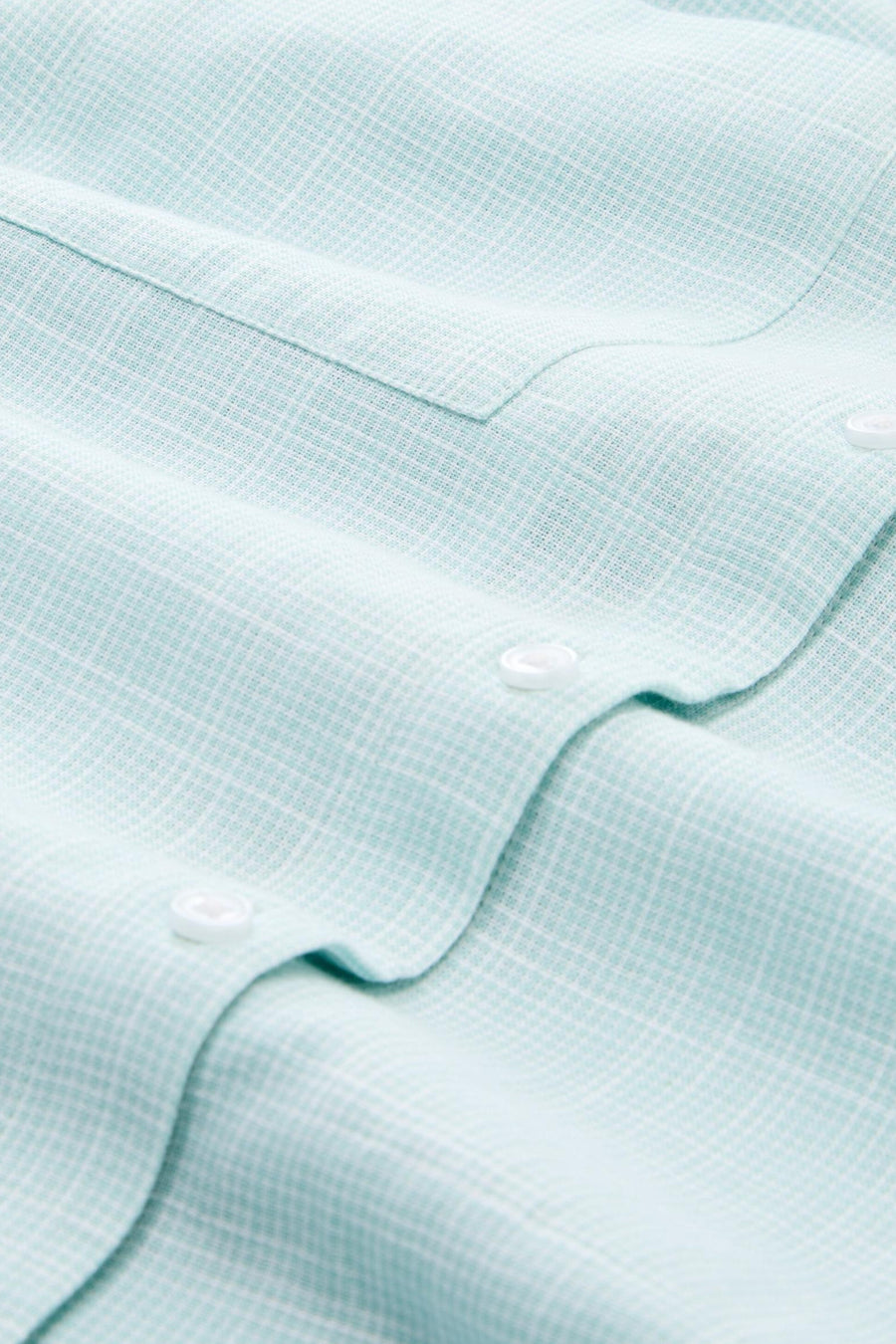 Chemise à manches longues verte à carreaux par Tom Tailor, avec boutons blancs et poche poitrine.